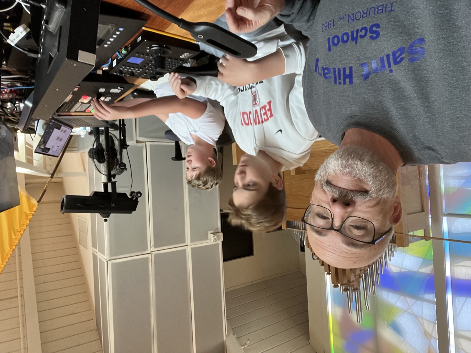 Jim Reitzel with two student volunteers at the switcher station